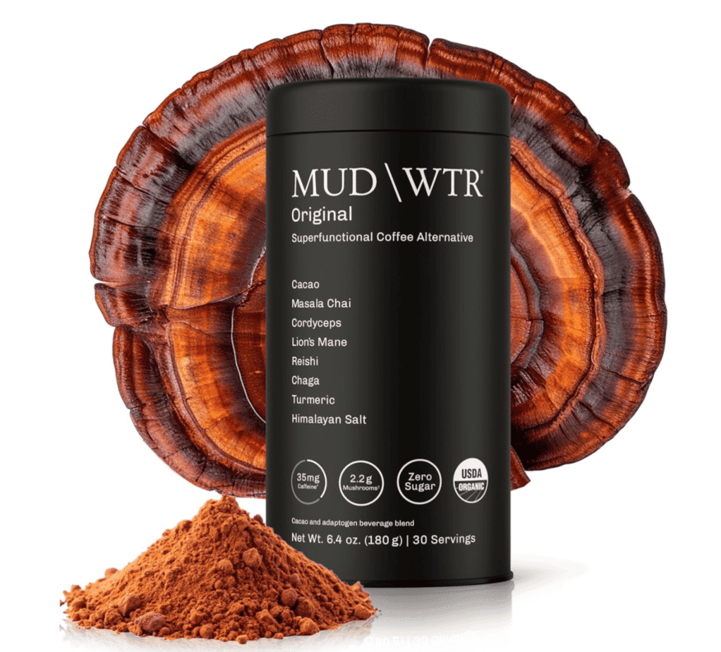 A case of MUD WTR in front of a mushroom with powder on the bottom left
