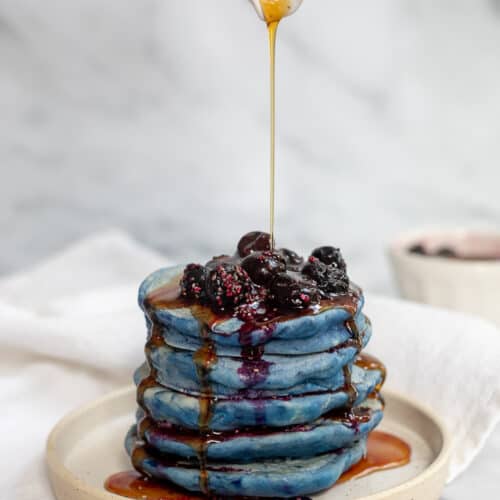 Blue pancakes with a maple syrup drizzle