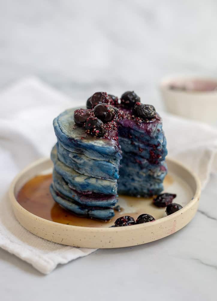 Blue pancakes with a blueberry compote