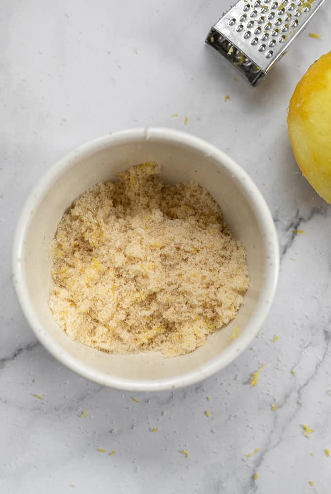 Lemon zest and sugar mixed together in a small bowl
