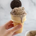 Vegan cookies and cream ice cream in a cone