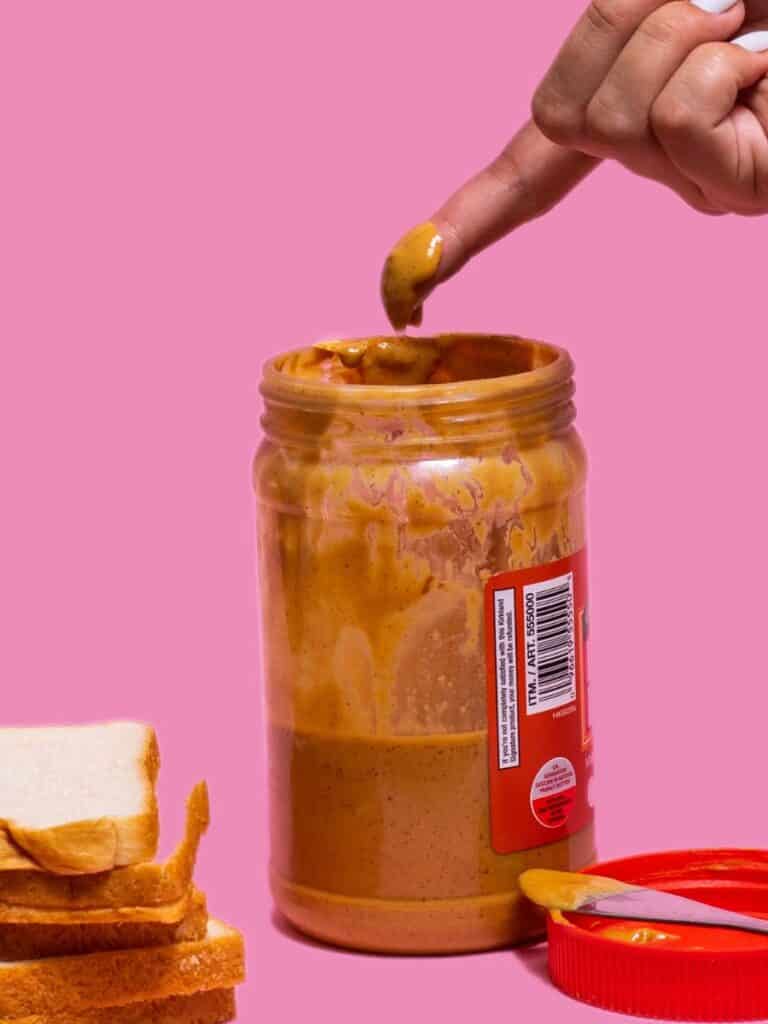 https://nourishedwithnatalie.com/wp-content/uploads/2023/05/Overnight-oats-container-peanut-butter-768x1024.jpg