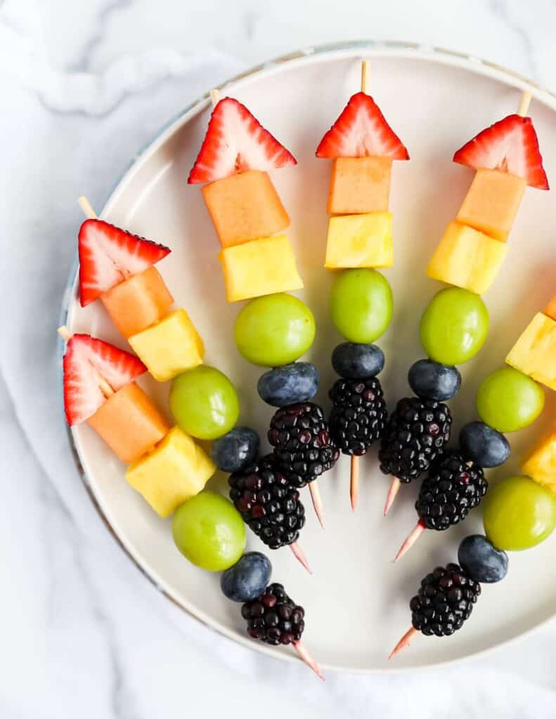 Fruit skewers on a plate