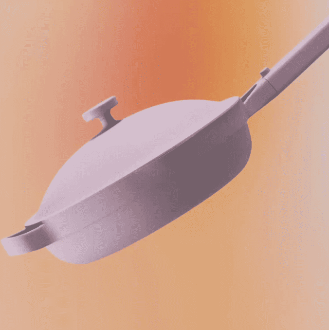 A purple always pan in front of an orange background