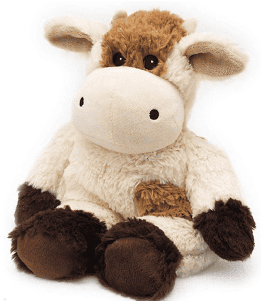 A cow stuffed animal with brown spots