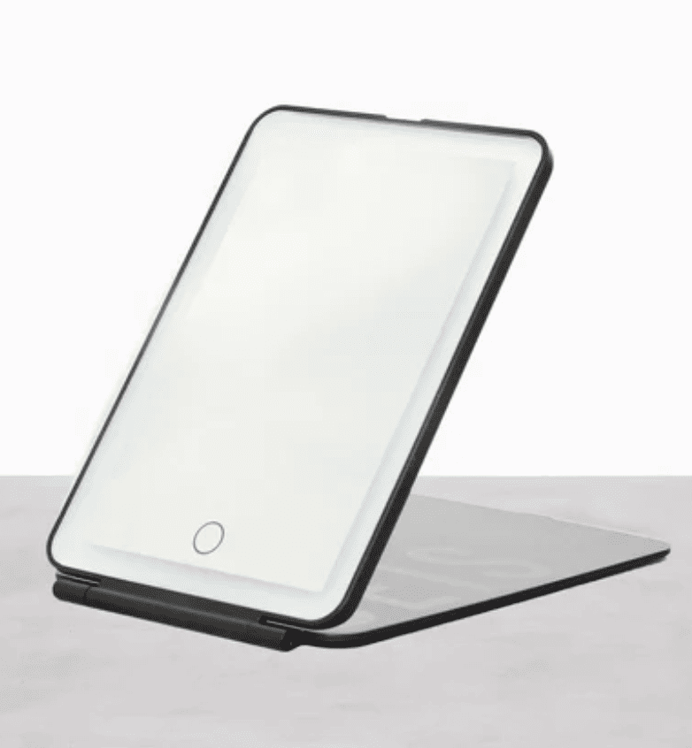 Lighted travel mirror