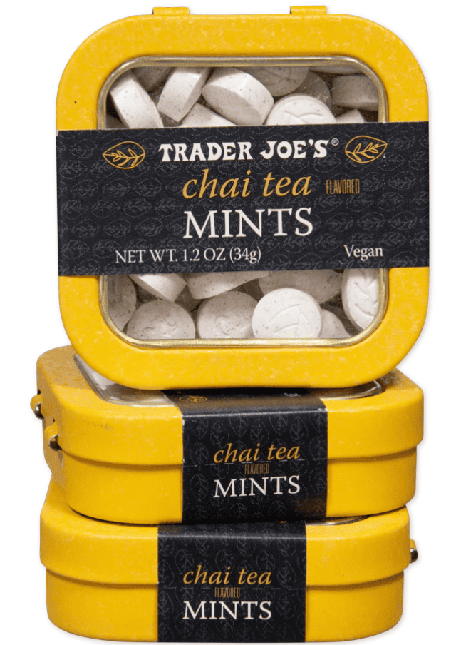 3 yellow containers of chai tea mints with a black label