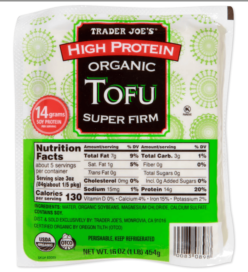 A green and white package of high protein tofu with a black and red label.