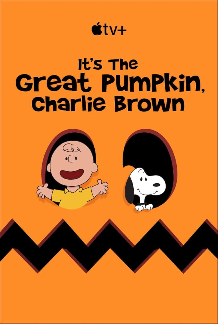 Charlie brown and snoopy peeking out of the eye's of a carved pumpkin with 'it's the great pumpkin, charlie brown' at the top.
