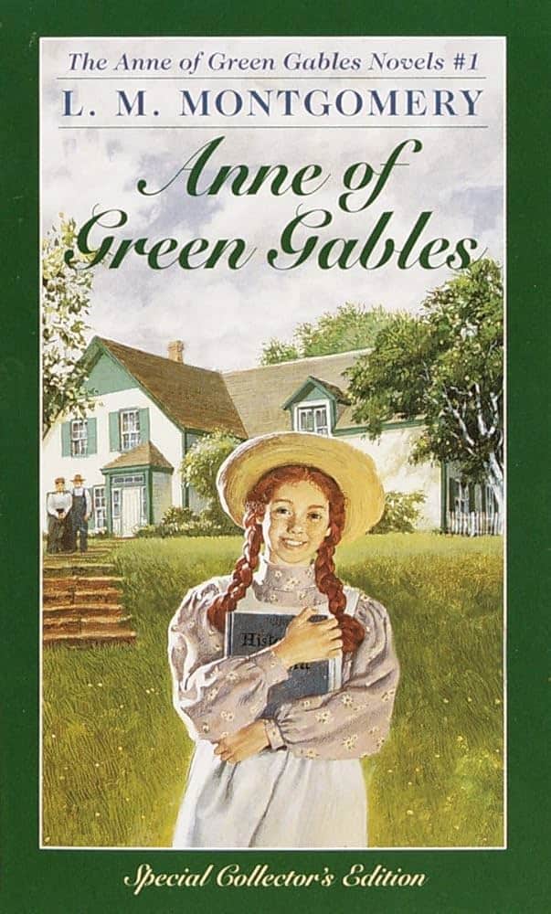 book cover for 'anne of green gables' with a house in the background and anne in the front