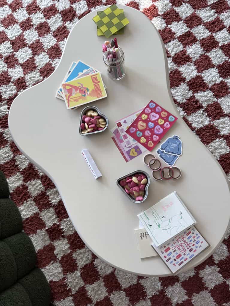 Card making station with washi tape, cards, and stickers