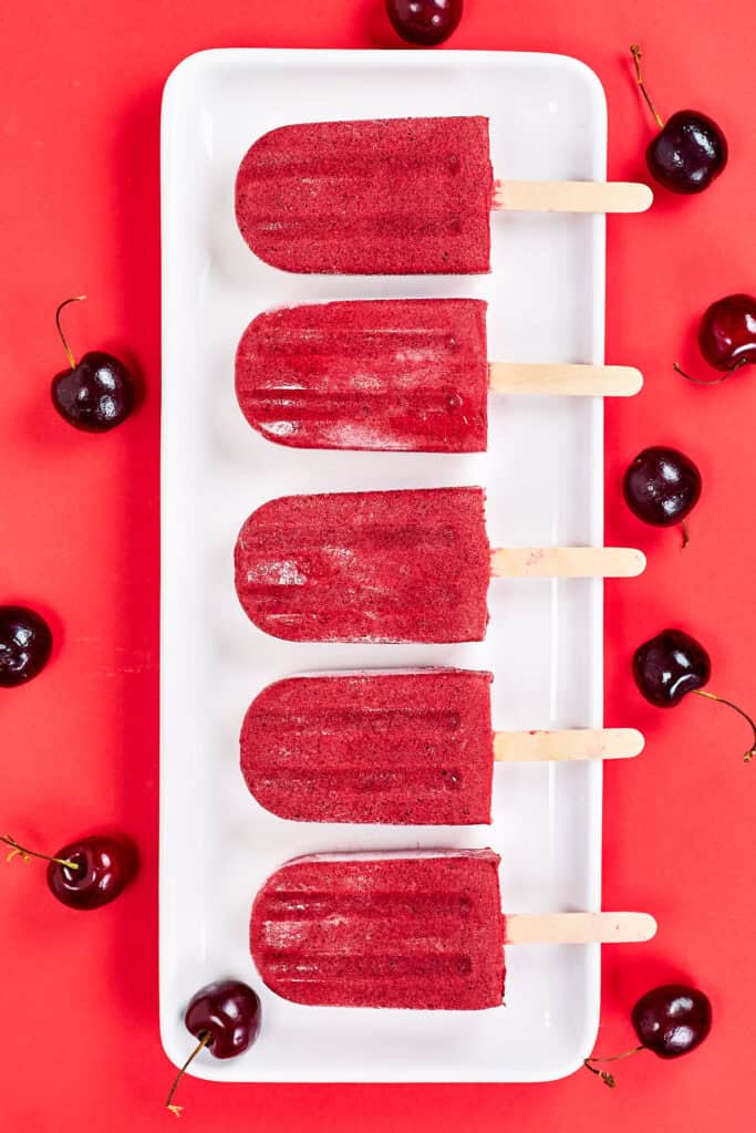 A top down shot of cherry popsicles