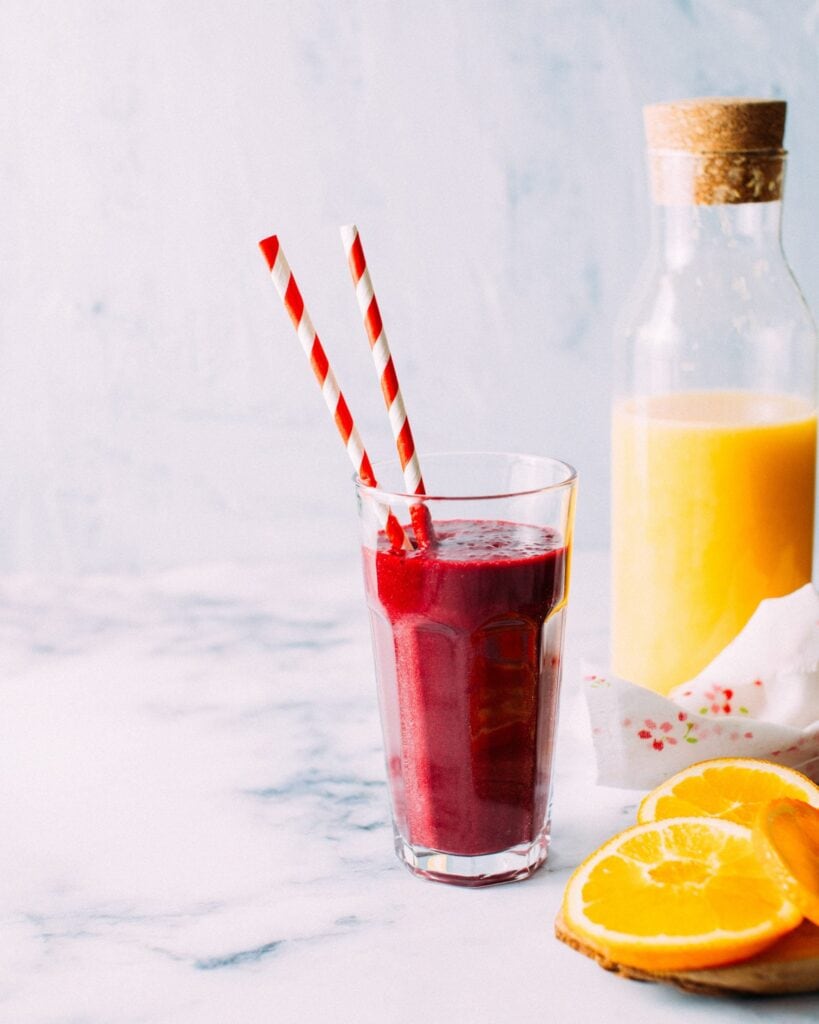 A glass of a cherry beet smoothie