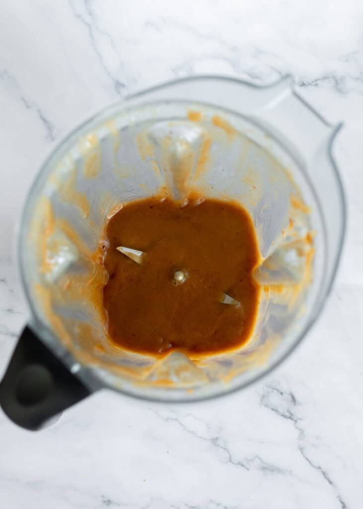 Ingredients for the date latte in a blender, after blending.