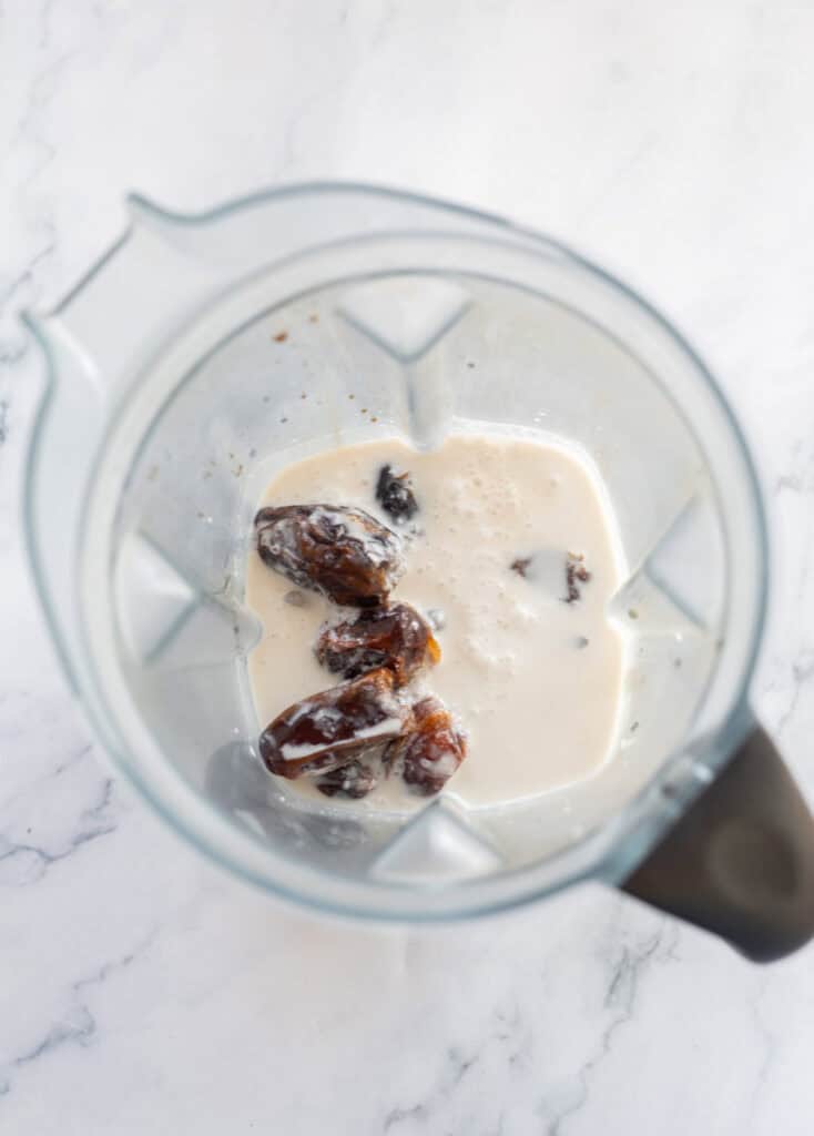 Ingredients for the date latte in a blender, before blending.